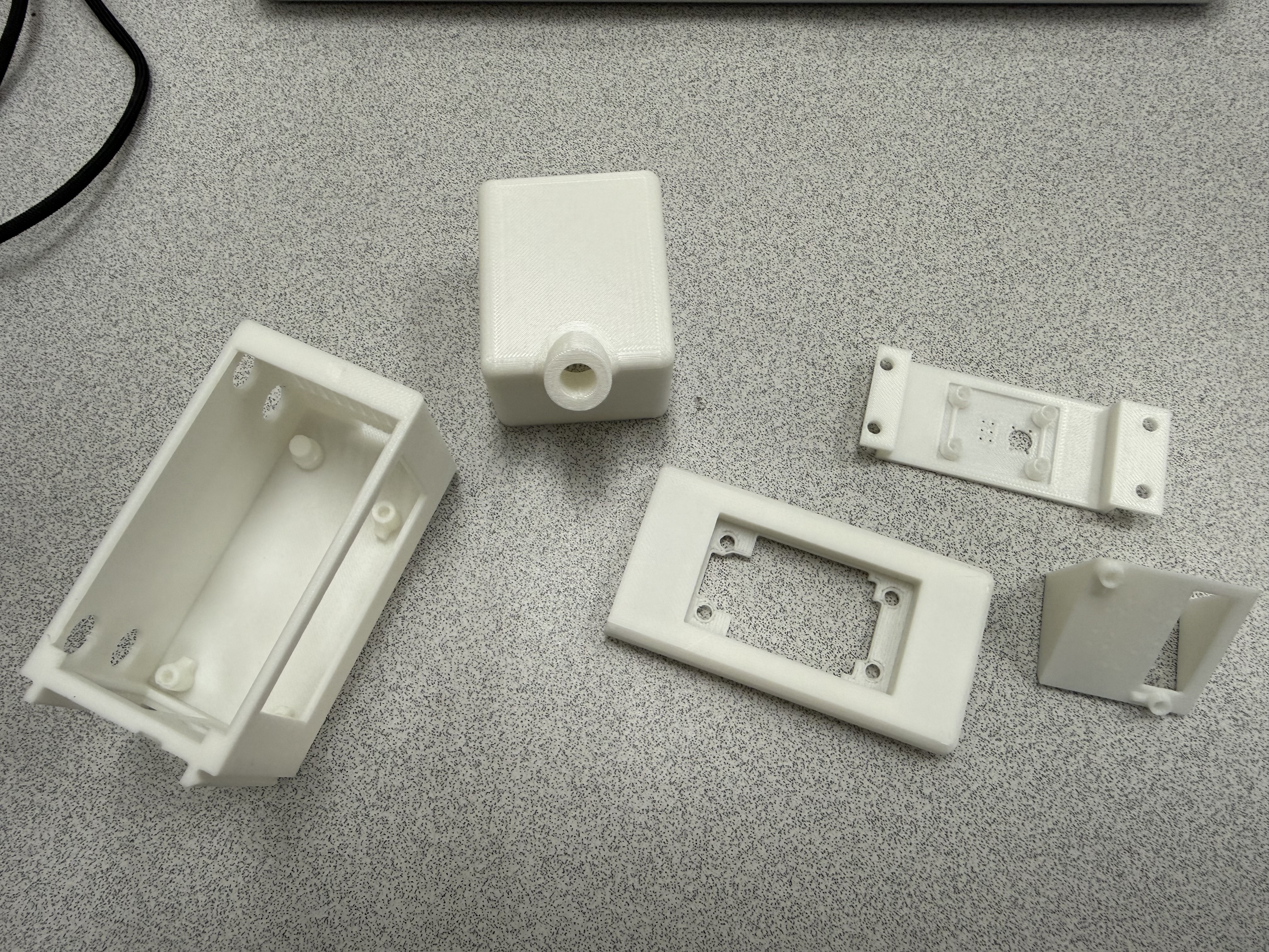 Disassembled 3D printed enclosure components